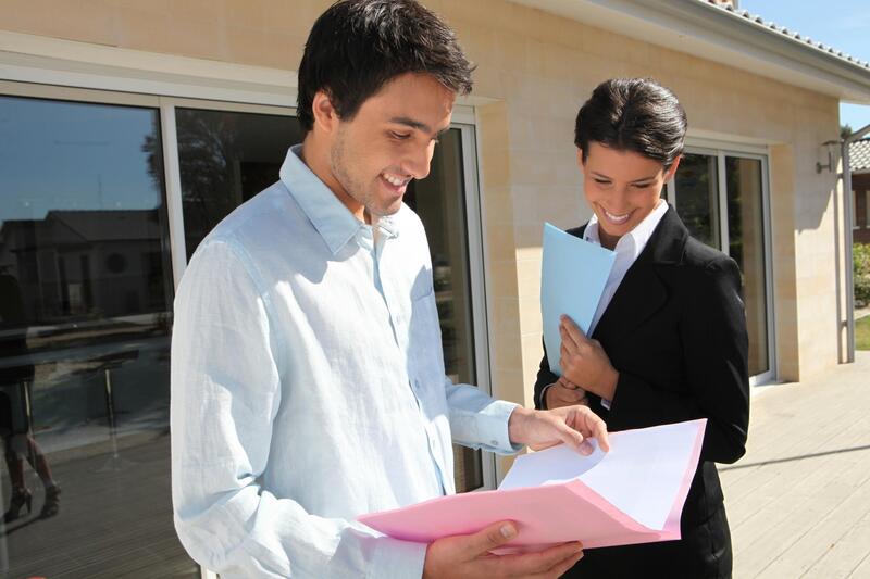 man and woman talking for selling house